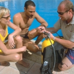 PADI Assistant Instructor Course | As a PADI Assistant Instructor, you not only gain additional experience as a PADI Professional scuba diver, but you also start learning the PADI System of diver education. You can act as an instructional scuba assistant and assume limited teaching responsibilities. It’s a great way to gain experience in order to become a scuba instructor! You build upon your abilities to organize and supervise scuba diving activities, while concentrating on developing teaching skills. The PADI Assistant Instructor course is the first portion of the PADI Instructor Development Course (IDC) and when followed by the Open Water Scuba Instructor course (OWSI) and successful performance at the Instructor Examination (IE), leads to certification as a PADI Open Water Scuba Instructor.