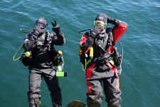 Isle Royale National Park | Two divers enjoying a dive at Isle Royale | Lake Superior maintains a variety of shipwrecks in outstanding condition for exploration and photography. These sunken vessels are protected by the National Park Service as cultural treasures to be enjoyed by you, the experienced scuba diver. | Lake Superior water is cold at all times. At the surface, water temperature rarely reaches 55 degrees Fahrenheit. Below 50 feet, divers can expect 34-37 degrees Fahrenheit temperatures. Protect yourself; a full wet suit is necessary and a dry suit is recommended. | Photo: James McKay, Scuba Center