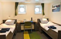 M/V Ortelius | Twin Porthole Cabin | Scuba Center Antarctica Group Trip